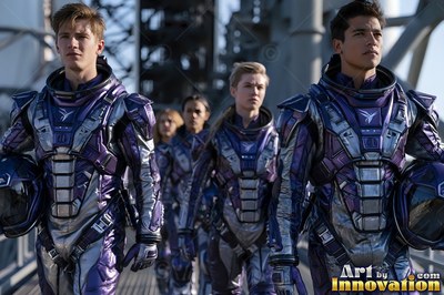 In purple and silver armored suits, an astronaut crew walks along an outdoor steel gantry