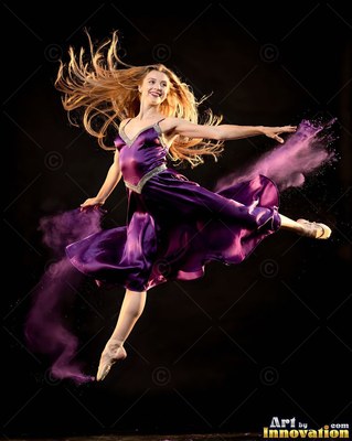 Leaping in midair against a dark background, a smiling woman wears a purple satin dress