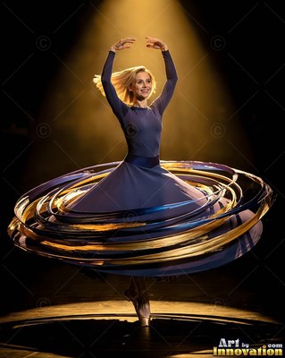 Spinning on pointe under a spotlight, a smiling woman wears a wide blue and gold skirt