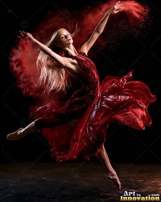 A woman leaps in a flowing red dress with red powder swirling around her