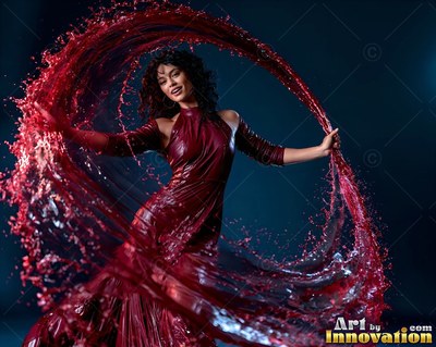 A woman in a shiny red dress spins inside swirling arcs of red liquid against a dark backdrop