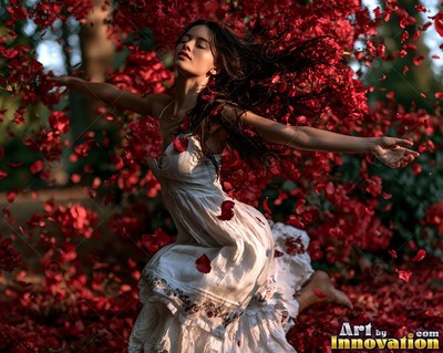 A woman in a white dress spins as bright red petals fly all around her