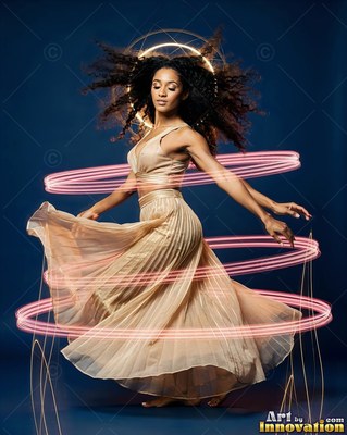In a dark studio, a woman spins in a gold dress inside pink rings of light