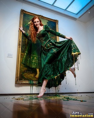 Woman in a green dress stepping out from a gold frame