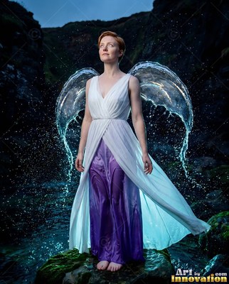 Woman in a white and purple dress with clear water wings outdoors