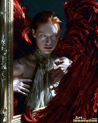 A woman with red feather wings steps through a mirror frame in dim light