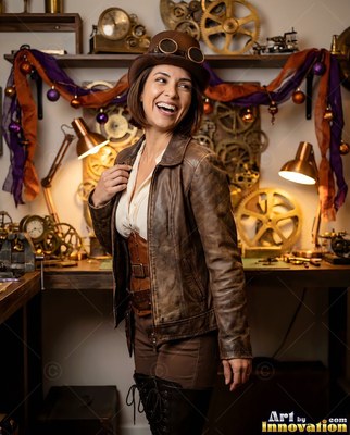 Laughing in a brown leather jacket, a woman wears a steampunk hat in a clock shop