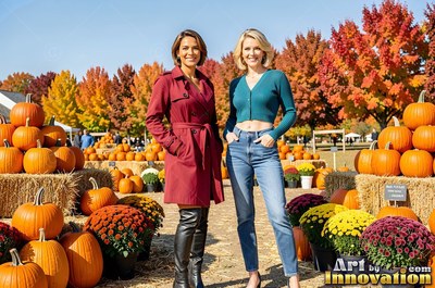 Standing side by side, two smiling women pose at a sunny pumpkin patch