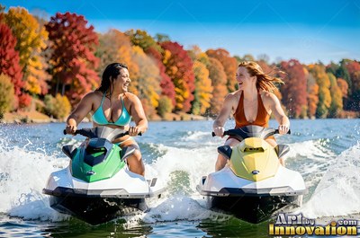 Sitting on jet skis side by side on a lake, two women laugh in the sun