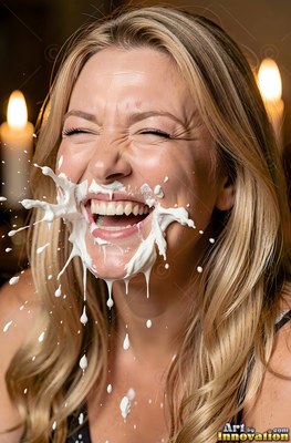A blonde woman breaks into laughter hard as plain white cream splatters over her face in warm light