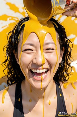 Laughing with eyes squeezed, a woman has yellow paint poured on her head