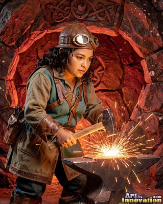 Leather goggles perched on her cap, a woman hammers metal on an anvil in a cave forge