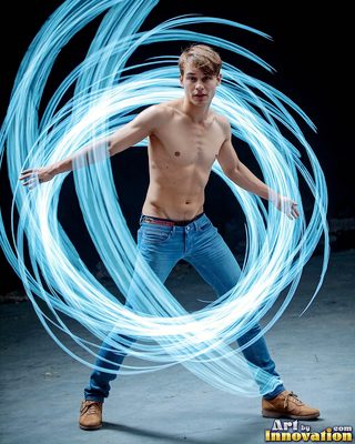 The male form in bold color, light, and motion. Cinematic UHD abstract art.