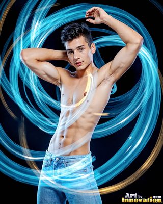 The male form in bold color, light, and motion. Cinematic UHD abstract art.