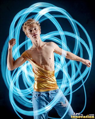 The male form in bold color, light, and motion. Cinematic UHD abstract art.