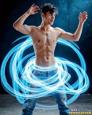 The male form in bold color, light, and motion. Cinematic UHD abstract art.