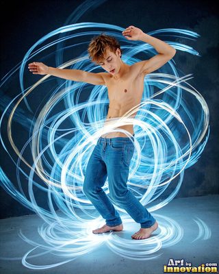 The male form in bold color, light, and motion. Cinematic UHD abstract art.