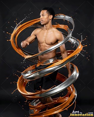 Walking forward in a dark studio, a shirtless man is encircled by silver and orange liquid
