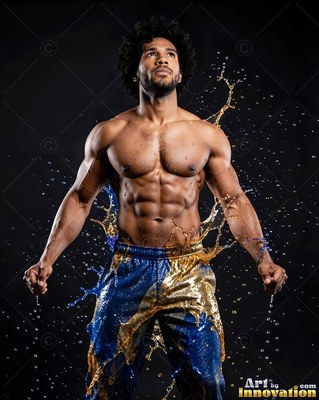 In a dark studio, a shirtless man flexes as water splashes around him