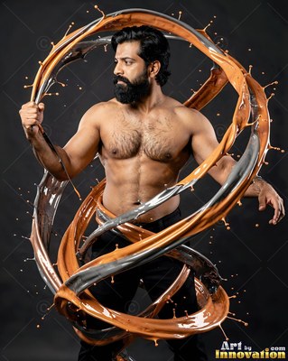In a dark studio, a shirtless bearded man holds loops of splashing liquid