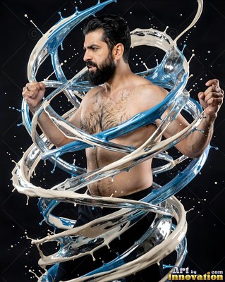 A bearded, shirtless man flexes his fists inside swirling white and blue liquid splashes