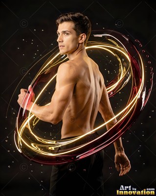 Looking back over his shoulder, a shirtless man is encircled by rings of bright light and fluid