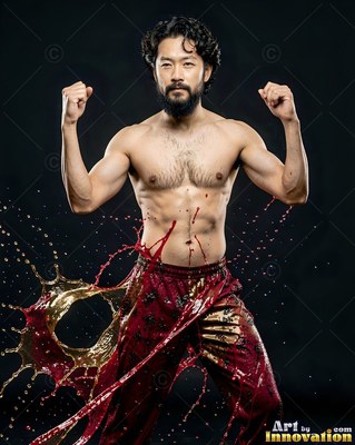 A shirtless man with raised fists stands as red and gold water splashes past him
