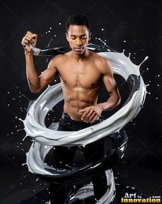 A shirtless man surrounded by swirling black and white liquid