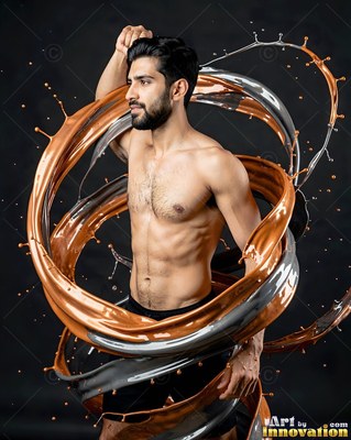 A shirtless man poses as swirls of copper and silver liquid splash around him