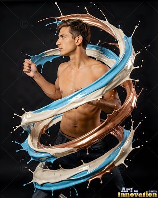 A shirtless man wrapped in swirls of splashing paint