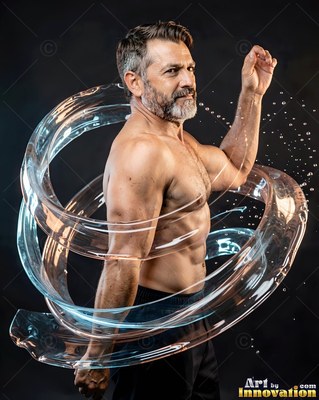 A shirtless older man poses as a spiral of clear water wraps around his body