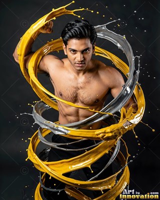 A shirtless man poses as spirals of yellow and silver paint swirl around him