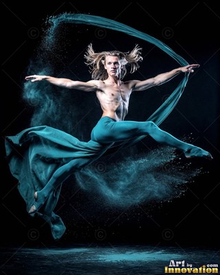 Leaping midair in a dark studio, a shirtless man trails teal powder and cloth