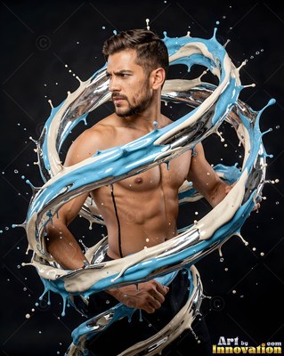 Looking aside, a shirtless man is encircled by rings of white and blue liquid splashes