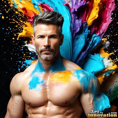 A shirtless man stands forward as thick blue and yellow paint splashes over his shoulder