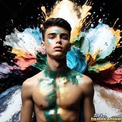 Green paint marks the chest of a shirtless young man before a burst of blue and yellow fluid in a dark studio