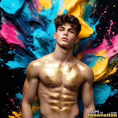 Facing forward in a dark studio, a shirtless man has gold paint on his chest and abs