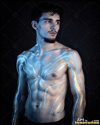 Shirtless man with light blue and gold paint on his torso