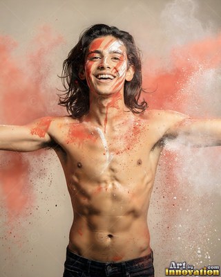 Streaks of red paint on his face, a shirtless man smiles through clouds of white and orange powder