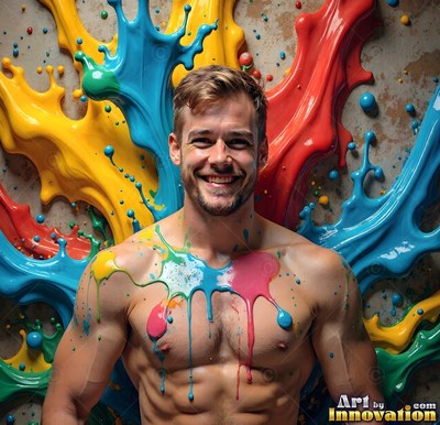 A bare-chested man smiling stands before heavy splashes of glossy poured blue and yellow paint