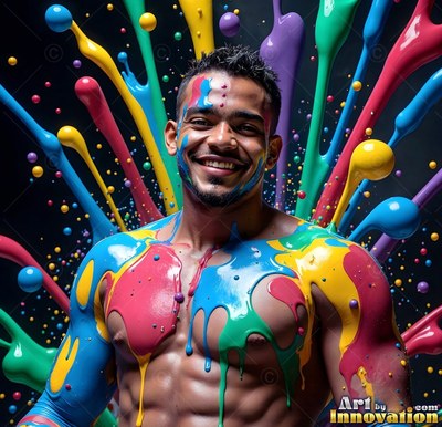 Facing forward in a dark room, a laughing man is covered in yellow and blue paint splashes