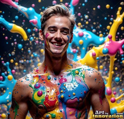 Before a dark background, a laughing shirtless man is covered in blue and yellow paint drops