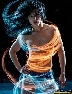 A young man with a bare chest poses with one hand on his hip, wrapped in loops of blue and orange light