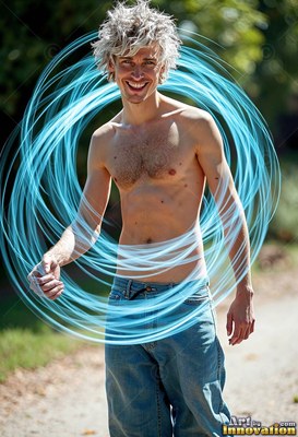 A man with a bare chest smiles while standing inside swirling rings of pale bright blue light