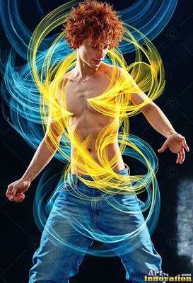 A shirtless man in jeans poses while trails of yellow and blue light swirl around him