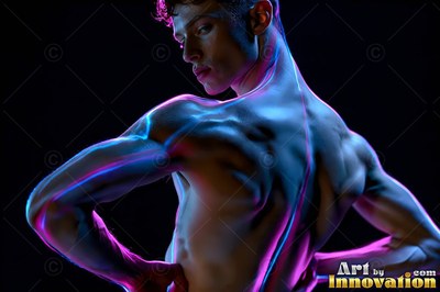 Turning to look back, a man with a bare chest stands in the dark with blue and pink light on his skin