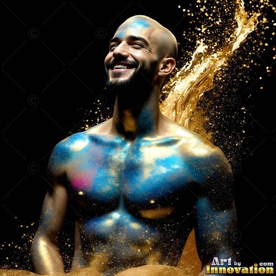 Smiling upward, a shirtless man is covered in gold and blue dust against dark shade