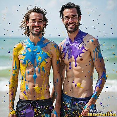 Two grinning bare-chested men covered in yellow and purple paint at the beach