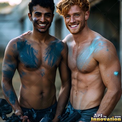 In a dusty outdoor arena, two bare-chested men grin with smeared blue paint on their chests