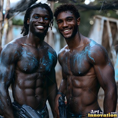 Standing shoulder to shoulder outdoors, two shirtless men grin with smeared blue paint on their skin